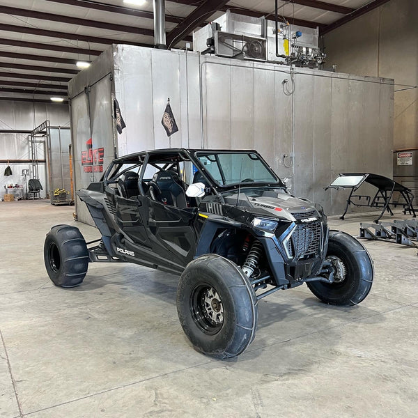 voodoo fast back roll cage installed on black polaris turbo s 